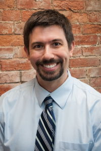 David Pfeiffer in blue shirt with tie